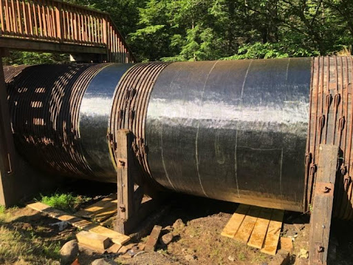 Wood stave penstock wrapped in CFRP